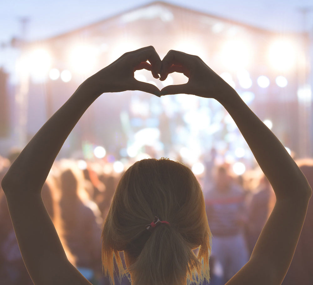 Woman enjoying a music concert